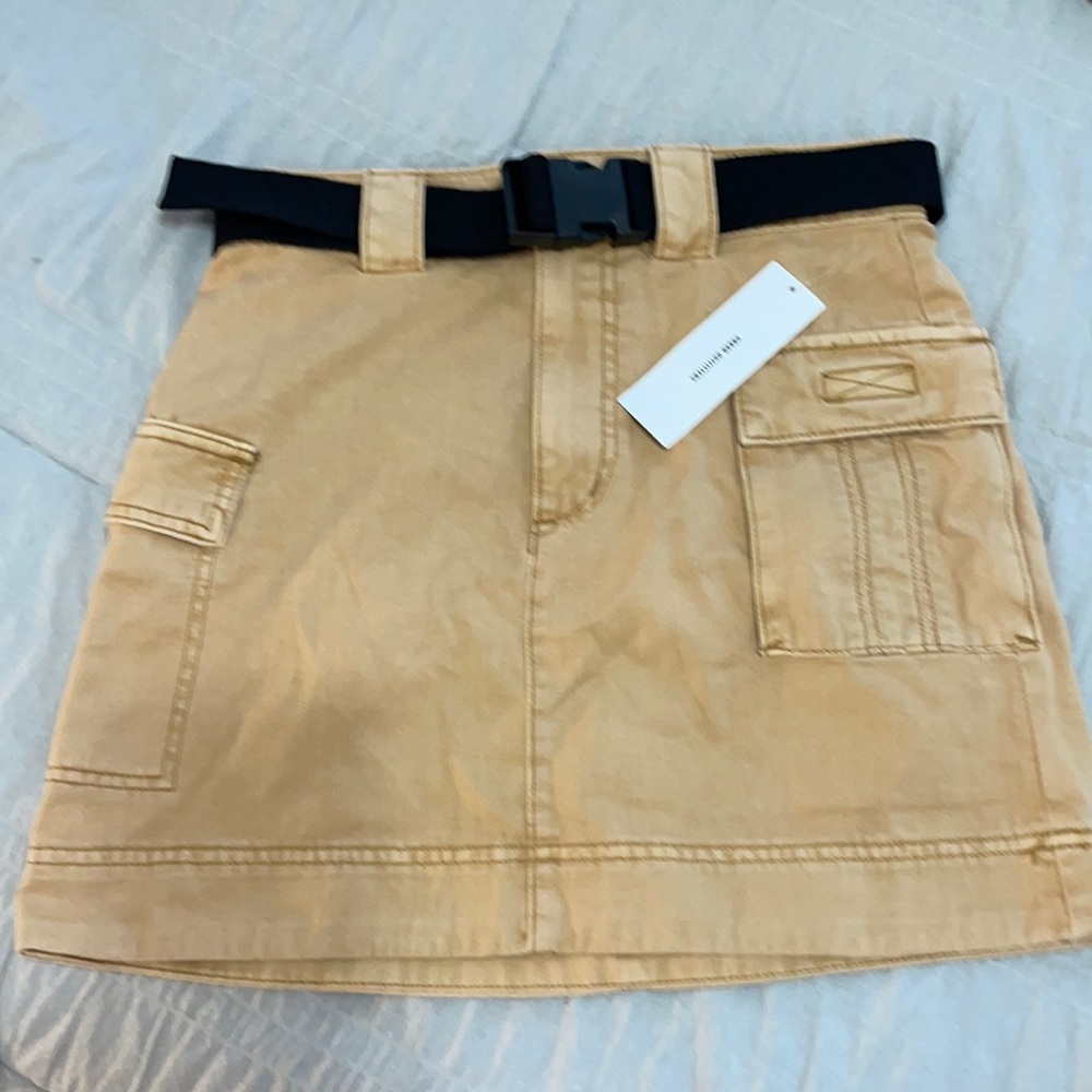 Tan utility style skirt with belt. Women’s size Small